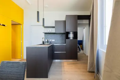 Cuisine ou kitchenette dans l'établissement Appartement chic vue imprenable sur le vieux port