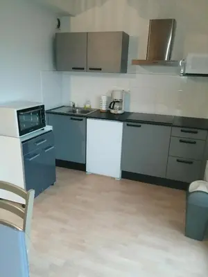 Cuisine ou kitchenette dans l'établissement Cavelier de la salle