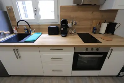 Cuisine ou kitchenette dans l'établissement Le Patio du 71 D