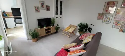 Télévision ou salle de divertissement dans l'établissement Logement Douce évasion