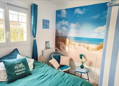 Un ou plusieurs lits dans un hébergement de l'établissement L''Eden Studio avec jardin, et parking