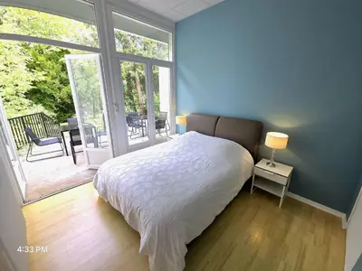Un ou plusieurs lits dans un hébergement de l'établissement LES LOGIS Du CHÂTEAU