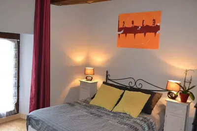 Un ou plusieurs lits dans un hébergement de l'établissement Le gîte 31 confort