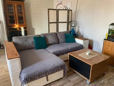 Coin salon dans l'établissement Le gîte 31 premium