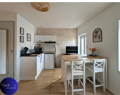 Cuisine ou kitchenette dans l'établissement L'Oasis by Cozylife - Centre Ville