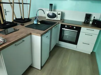 Cuisine ou kitchenette dans l'établissement Appartement de ville