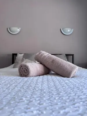 Un ou plusieurs lits dans un hébergement de l'établissement AppartHotel le Nid Marin