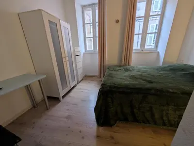 Un ou plusieurs lits dans un hébergement de l'établissement Appartement du Cordouan, lumineux, calme et central a 100m du marché