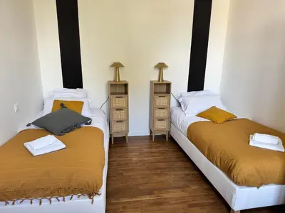 Un ou plusieurs lits dans un hébergement de l'établissement Maison Malabry en hyper centre avec jardin 6 pers