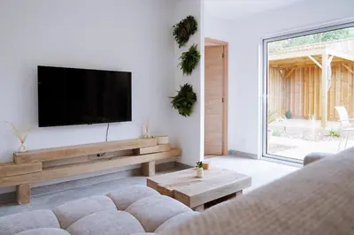 Télévision ou salle de divertissement dans l'établissement Cottage du golf de saint laurent de la prée