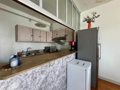 Cuisine ou kitchenette dans l'établissement La Maison D'Isis