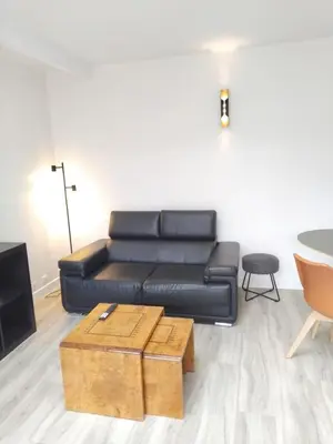 Coin salon dans l'établissement Loc'Issime ! Clim - PK privé gratuit