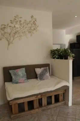 Coin salon dans l'établissement Maison confortable 4 personnes - 2 chambres - Espaces partagés
