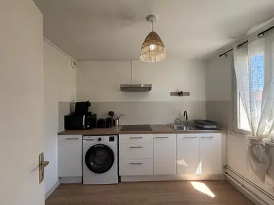 Cuisine ou kitchenette dans l'établissement Le Gardena - Parking - 2 Beds