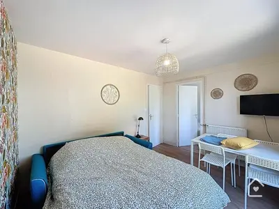 Télévision ou salle de divertissement dans l'établissement Le Gardena - Parking - 2 Beds
