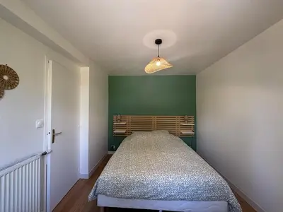 Un ou plusieurs lits dans un hébergement de l'établissement Le Gardena - Parking - 2 Beds