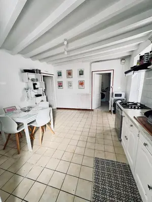 Cuisine ou kitchenette dans l'établissement Maison cosy