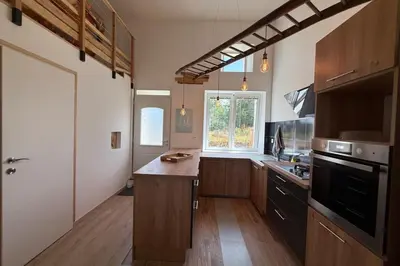 Cuisine ou kitchenette dans l'établissement La Maison de Porcher