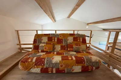Un ou plusieurs lits dans un hébergement de l'établissement La Maison de Porcher