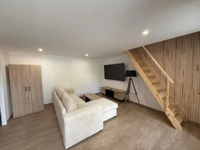 Télévision ou salle de divertissement dans l'établissement Petite maison chez l habitant