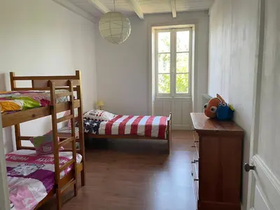 Un ou plusieurs lits dans un hébergement de l'établissement Gitevdelacour