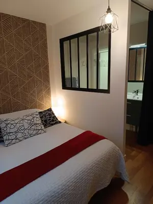 Un ou plusieurs lits dans un hébergement de l'établissement Grand appartement 80 m2 centre ville lumineux