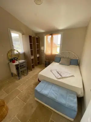Un ou plusieurs lits dans un hébergement de l'établissement La chambre solaire à la ferme