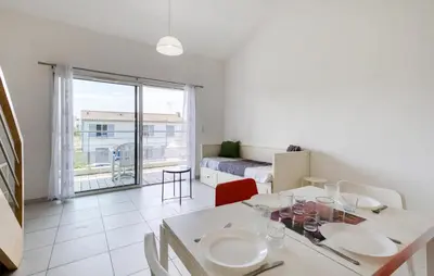 Coin salon dans l'établissement Appartement Proche Plage