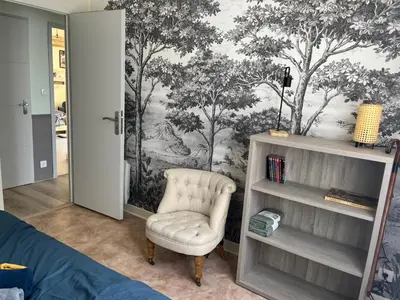 Coin salon dans l'établissement Maison Cosy Retour de plage