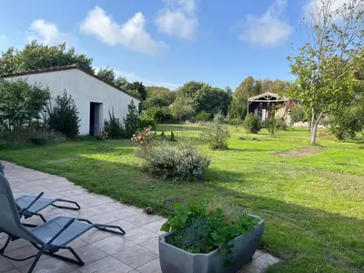 Jardin de l'établissement Maison Cosy Retour de plage
