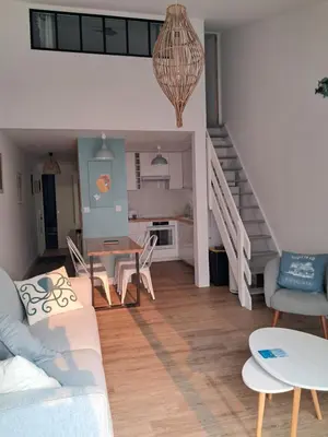 Coin salon dans l'établissement Au Bord de l'Océan