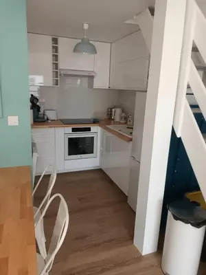 Cuisine ou kitchenette dans l'établissement Au Bord de l'Océan