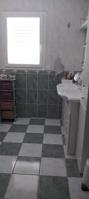 Cuisine ou kitchenette dans l'établissement La chambre aux Iris