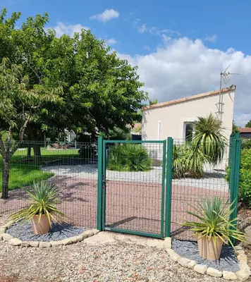 Jardin de l'établissement Cottage Escale Nature & Sérénité - spa privatif