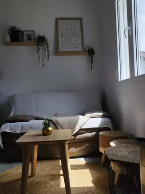 Coin salon dans l'établissement Cottage Escale Nature & Sérénité - spa privatif