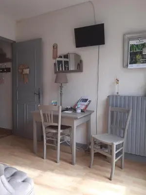 Télévision ou salle de divertissement dans l'établissement Maison d'hôtes LE LAVOIR