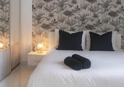 Un ou plusieurs lits dans un hébergement de l'établissement Coup de cœur maison de charme