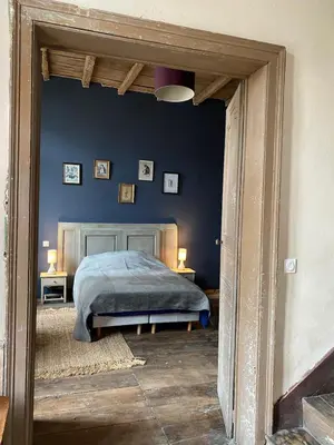 Un ou plusieurs lits dans un hébergement de l'établissement Entre fleuve et ville, charmante petite maison 18e