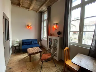 Coin salon dans l'établissement Entre fleuve et ville, charmante petite maison 18e