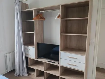 Télévision ou salle de divertissement dans l'établissement Maison Cosy Porte de La Rochelle