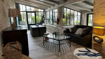 Coin salon dans l'établissement Maison au calme proche de La Rochelle