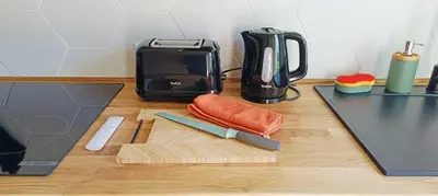 Cuisine ou kitchenette dans l'établissement Studio Neuf idéalement placé avec TERRASSE et JARDIN