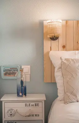 Un ou plusieurs lits dans un hébergement de l'établissement Hôtel Le Rivage vue sur mer - Châtelaillon-plage