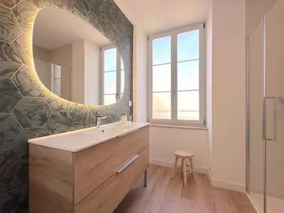 Salle de bains dans l'établissement Gite Le 14-16
