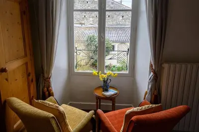 Coin salon dans l'établissement Les Jonquilles