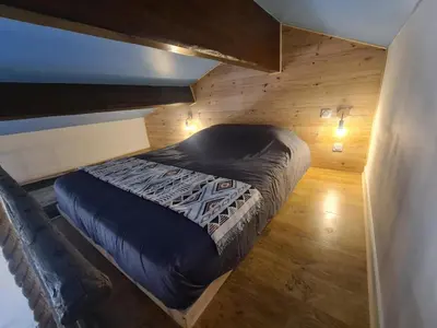 Un ou plusieurs lits dans un hébergement de l'établissement Studio mezzanine chez des mushers