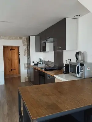 Cuisine ou kitchenette dans l'établissement Maison 1 chambre double