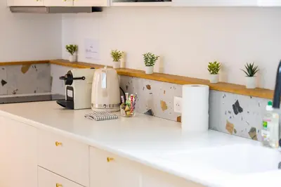 Cuisine ou kitchenette dans l'établissement L'Arche #Climatisation #4pers
