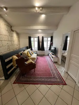 Coin salon dans l'établissement Maison entière - centre ville, parking réservé