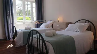 Un ou plusieurs lits dans un hébergement de l'établissement Maison Plain-Pied
